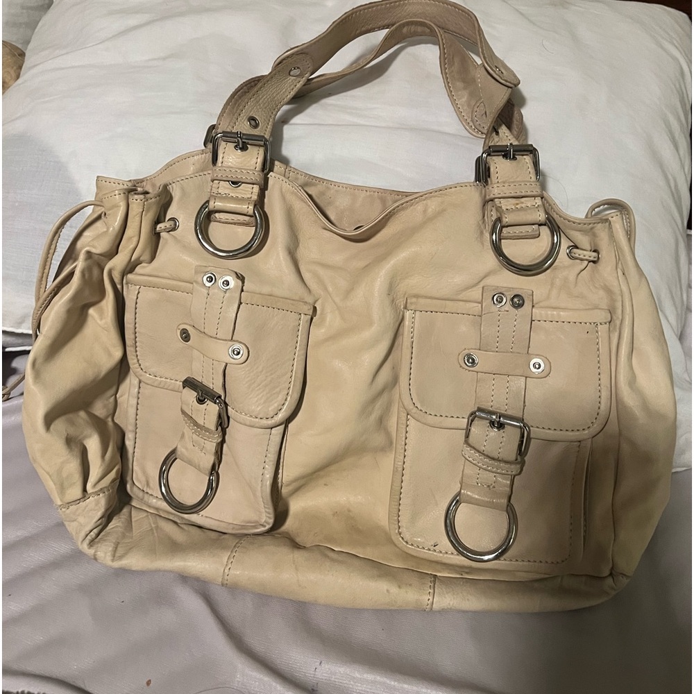 Bebe beige leather large bag with multiple pockets. Wore one time